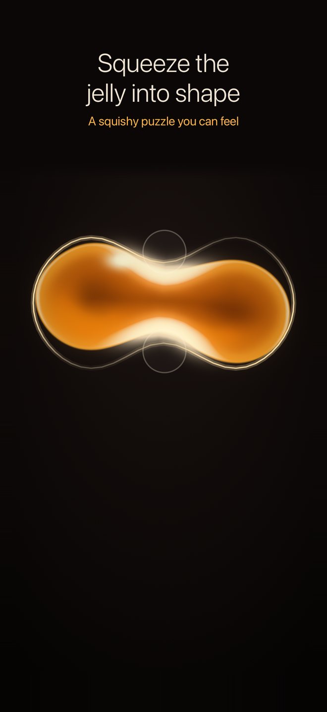 Two fingers squeezing the glowing jelly into a peanut shape